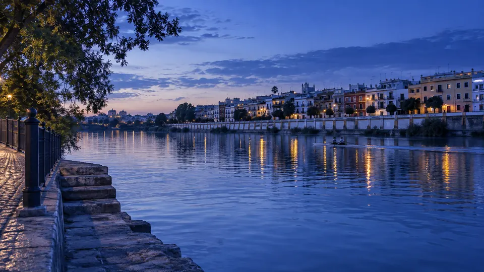 The Triana riverside at dusk
